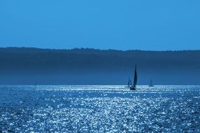 lake constance sailing boat blue colored