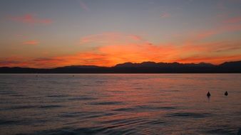 orange sky on a lake horizon at sunset