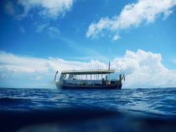 traditionally decorated motor boat at blue sea