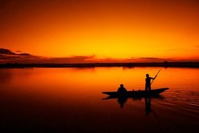 picture of fishing boat at the sunset