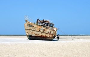 old abandoned ship on the sand