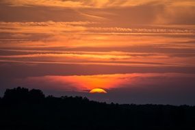 Orange sunset mood from afterglow clouds