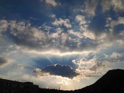 clouds in the sunlight over the mountains