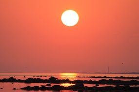 Full moon on a red sky