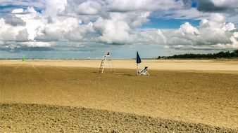 cloudly sky over the sand beach