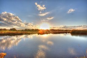 Sunrise behind the lake