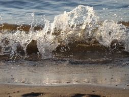 splashes and water and sand in the river