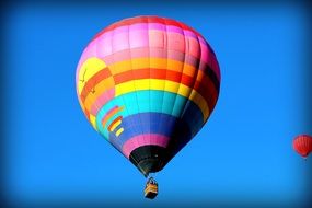 Bright balloon against the blue sky