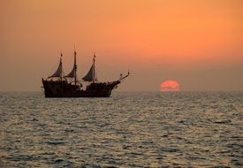 boat in the ocean on a background of the sun in the sunset, mexico
