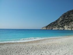 beach near the sea with turquoise water