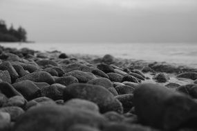 grey stones on beach sea panorama