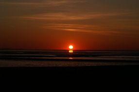 distant view of the bright sunset sun