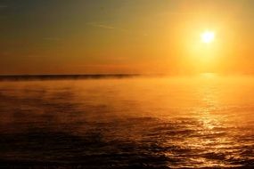 scenic golden mist above lake superior at sunset, usa