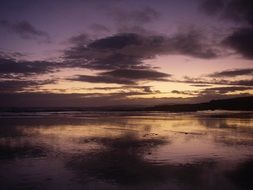 purple sky and sea at dusk, ireland