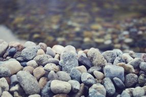 Closeup photo of Pebbles on a beach