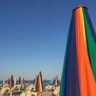 colorful umbrellas on the beach in rimini