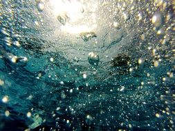 bubbles in the water after diving close up