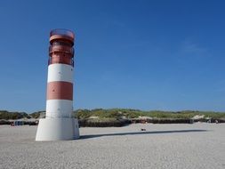 irresistible lighthouse on the north sea coast