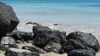 Black stones on a beach