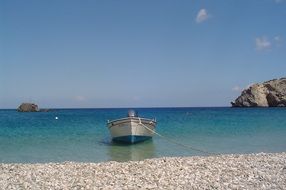 boat on blue water in greece, karpathos