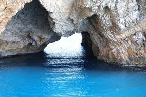 Cave rock above the water on the mediterranean sea