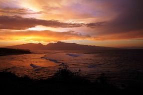 gold orange sunset over Hawaii
