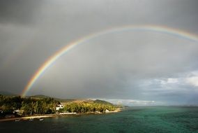 rainbow at sea coast dramatic view