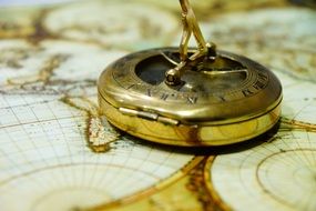 golden compass antique map of the world