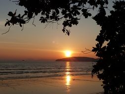 sunset over the beach in thailand