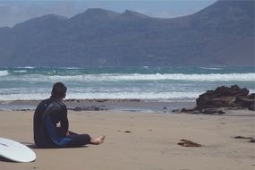 Surfer on beach