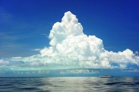 Boat under the clouds
