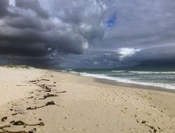 storm clouds over a tropical beach
