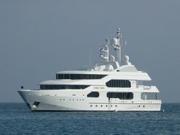 white big yacht on the water