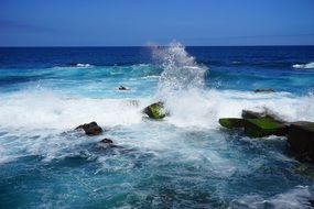 rocks in the blue sea