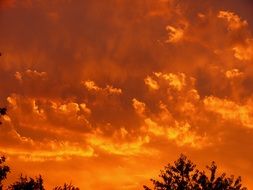red sunset clouds in the evening sky