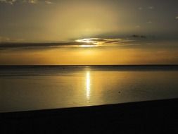 landscape of sunset above calm sea, twilight