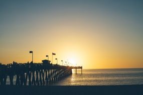 wooden pier at sunset background