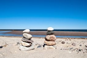 Stacked stones on a beach