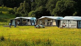campground in a green meadow