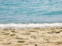 sea, sea foam and warm sand