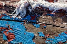 wooden boards with paint on a boat