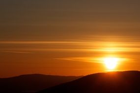 setting sun over the horizon