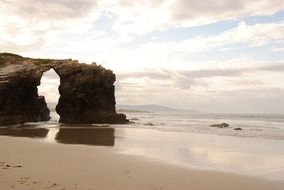 cloudy sky over beach of the cathedrals