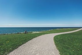 gravel on a bike path along the ocean