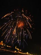 fireworks in night sky above chain bridge, hungary, budapest