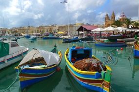 picturesque fishing boats at port, malta, gozo