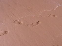 footprints on the red sand