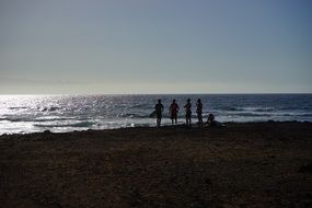 People on the beach of playa de las americas resort, spain, Tenerife