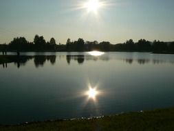 bright sun over the pond