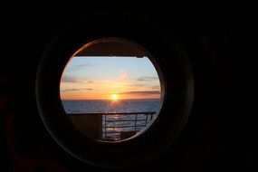 gold sunset from luxury cruise ship view